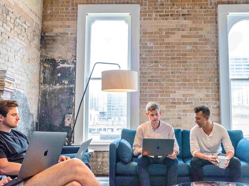 people working in a modern co-working space