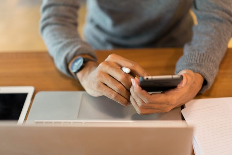 a person receiving a password reset notification on his phone